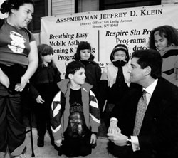 Assemblyman Jeff Klein visits with children who participate in the Breathing Easy Mobile Asthma Screening and Testing Program.