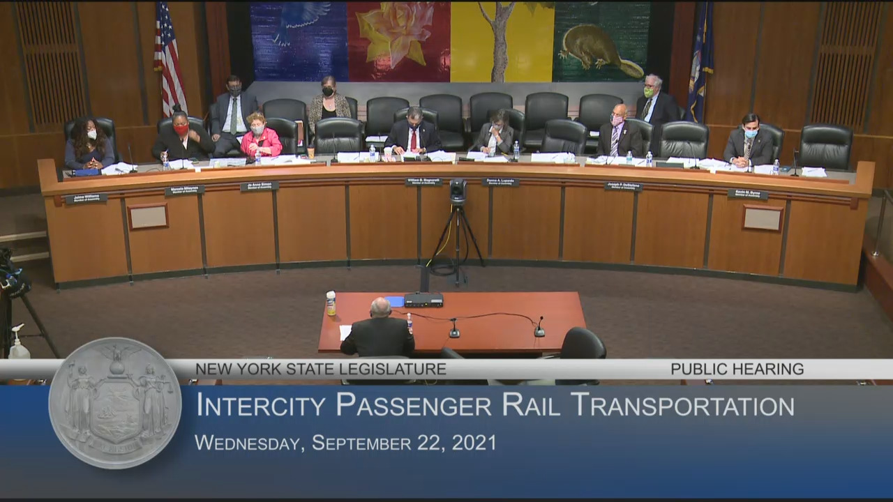 Simon Questions Amtrak Official at Public Hearing