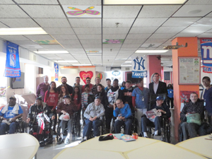 Assemblyman Edward C. Braunstein at the St. Albans VA Community Living Center with hospitalized veterans, as well as his staff, St. Albans VA Assistant Chief of Voluntary Service Lisa Cummings, Benjamin N. Cardozo High School students, and Cardozo High Sc