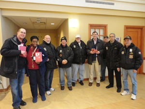 Assemblyman Edward C. Braunstein is pictured with members of the Vietnam Veterans of America Chapter #32 and Deirdre Samuel, Coordinator of Volunteer Services at the NYS Veterans Home at St. Albans.