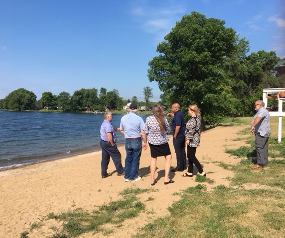 Pictured with Speaker Heastie in the first photo at Chaumont Village Beach (from left to right): Town of Lyme officials and Assemblymember Addie Jenne.