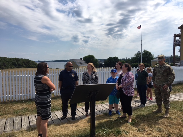 Pictured with Speaker Heastie in the second photo at Sackets Harbor Battlefield State Historic Site (from left to right): Sackets Harbor Schools Superintendent Jennifer Gaffney, Assemblymember Addie Jenne, Sackets Harbor Mayor Reilly and Captain Marquis