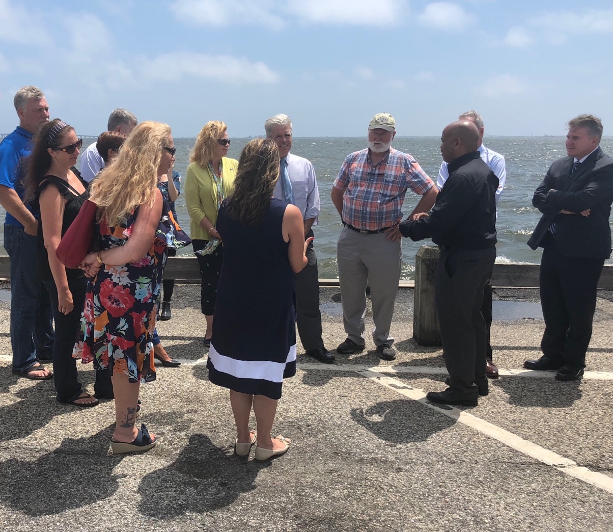 Pictured with Speaker Heastie in the second photo at the Babylon Village Main Docks (from left to right): marine scientists and members of local non-profits, Assemblymember Christine Pellegrino, Suffolk County Executive Steve Bellone and Dr. Malcolm Bowma
