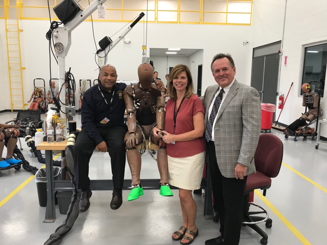 Pictured in the first photo with Speaker Heastie at Calspan Corporation crash lab (from left to right): Assemblymember Monica Wallace and Calspan Corporation Director Jerry Goupil.