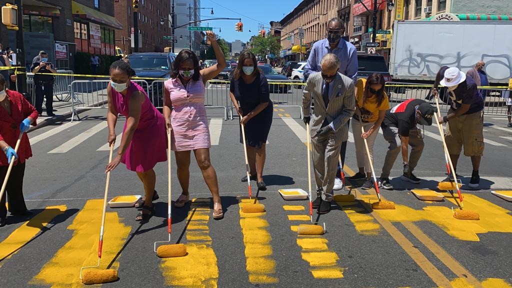 Assemblymember Bichotte, Assemblymember Tremaine Wright, New State 
Attorney General Letitia James, Council Member Robert Cornegy, Jr., Community Advocate and Leader Al Sharpton, Director & Actor Spike Lee with others at a Black Lives Matter street painting event at Bedford-Stuyvesant’s Restoration Plaza on 6/13/2020.