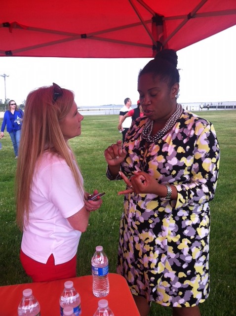 Assemblywoman Jean-Pierre speaks with a constituent at the Copiague Community Cares Family Fun & Awareness Day