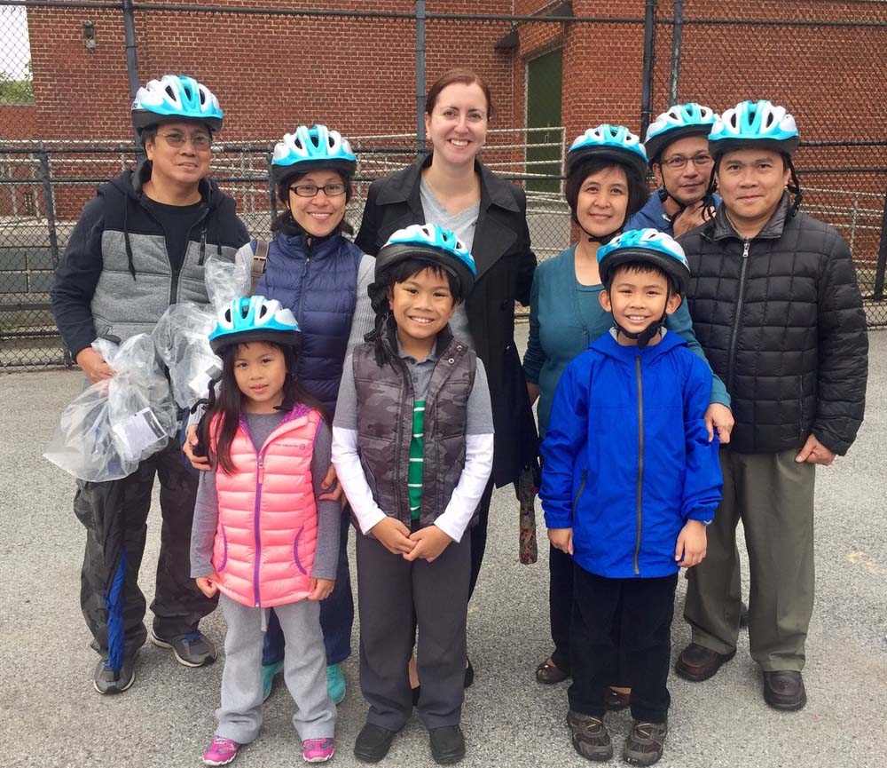 Assemblywoman Nily Rozic teamed up with the City Department of Transportation to organize a free bike helmet giveaway that was held at P.S. 46 Alley Pond School.