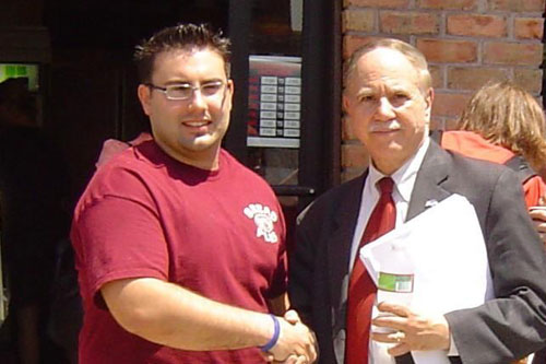 Assemblyman Colton is seen here meeting with a local bakery owner on the importance of the B64 bus to his business.