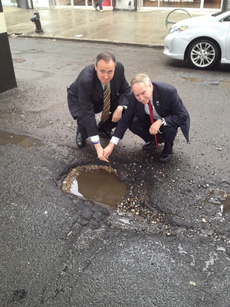 Assemblymember William Colton and Councilmember Mark Treyger documenting neighborhood pot holes to get the New York City Department of transportation to repave neighborhood streets.