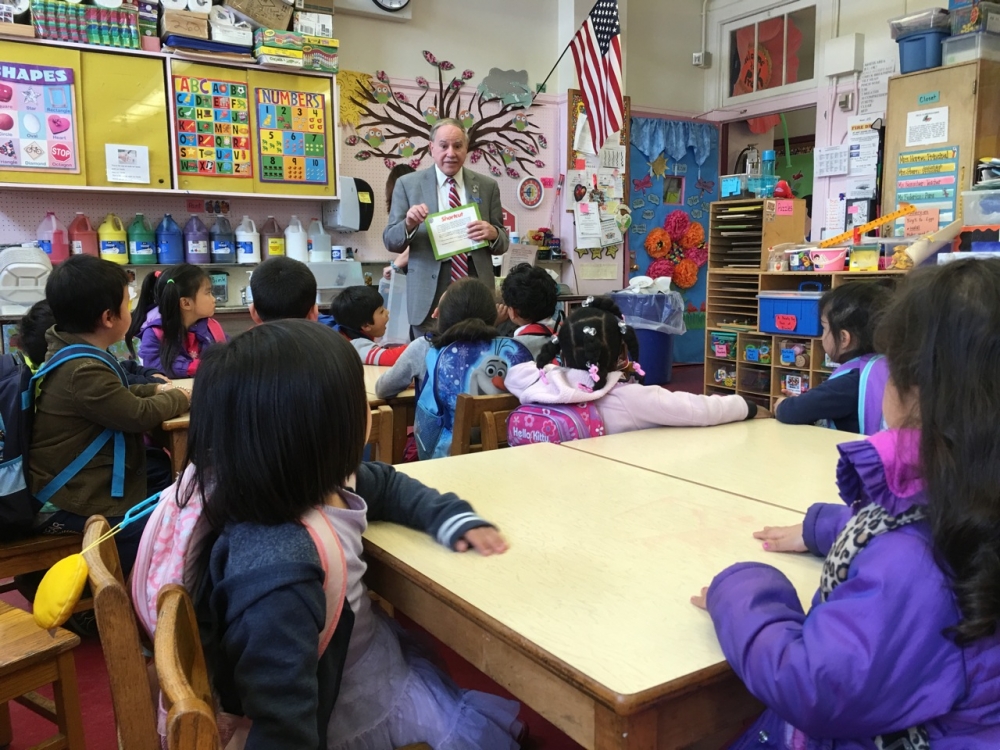 Assemblymember William Colton reading to kindergarten class at Public school 212.