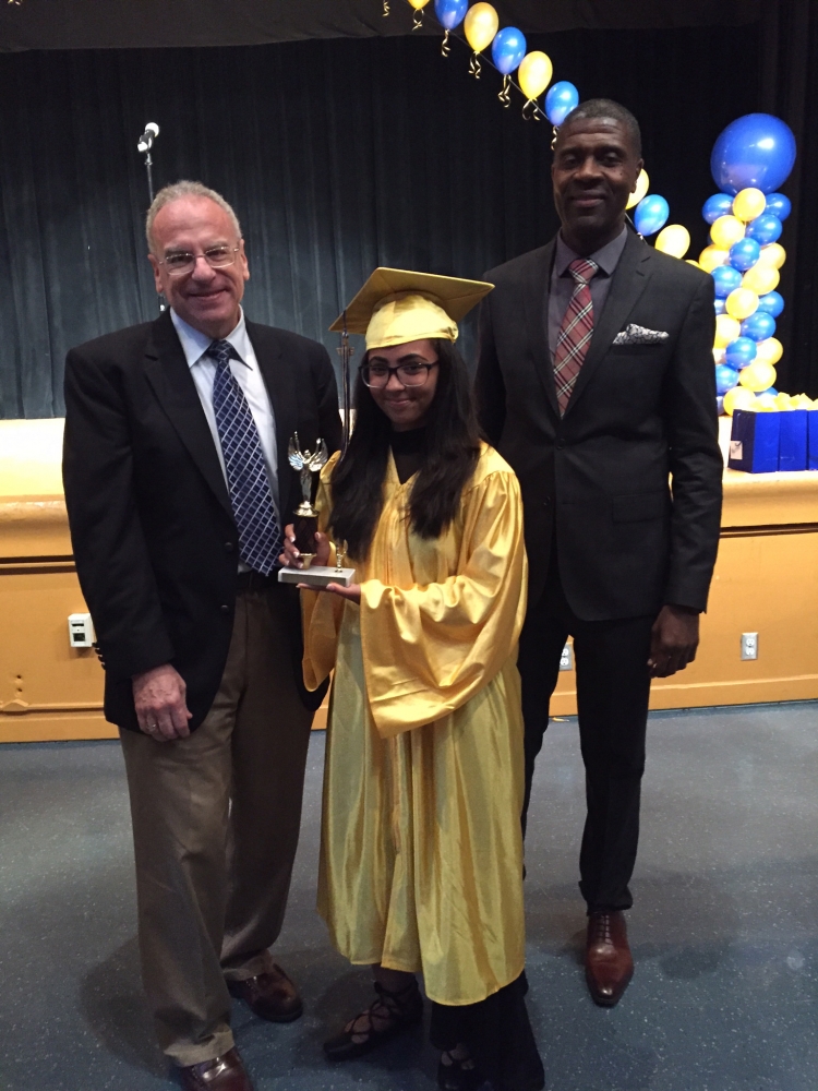 Assemblyman Dinowitz attending the June 23rd Graduation Ceremony of PS 95 pictured presenting the Community Service Award to Jada Singer.