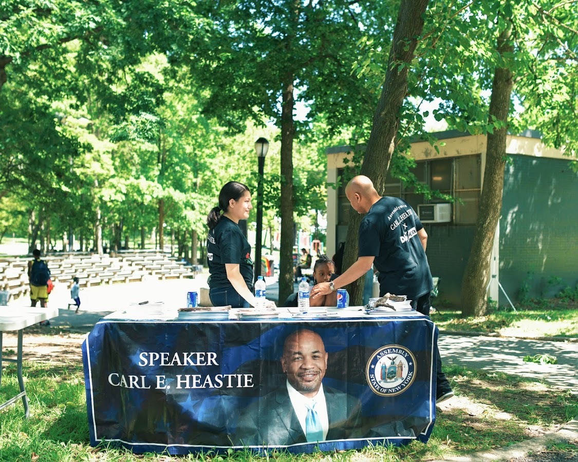 Speaker Heastie setting up for our 1st Annual Music Over Violence event in Haffen Park.