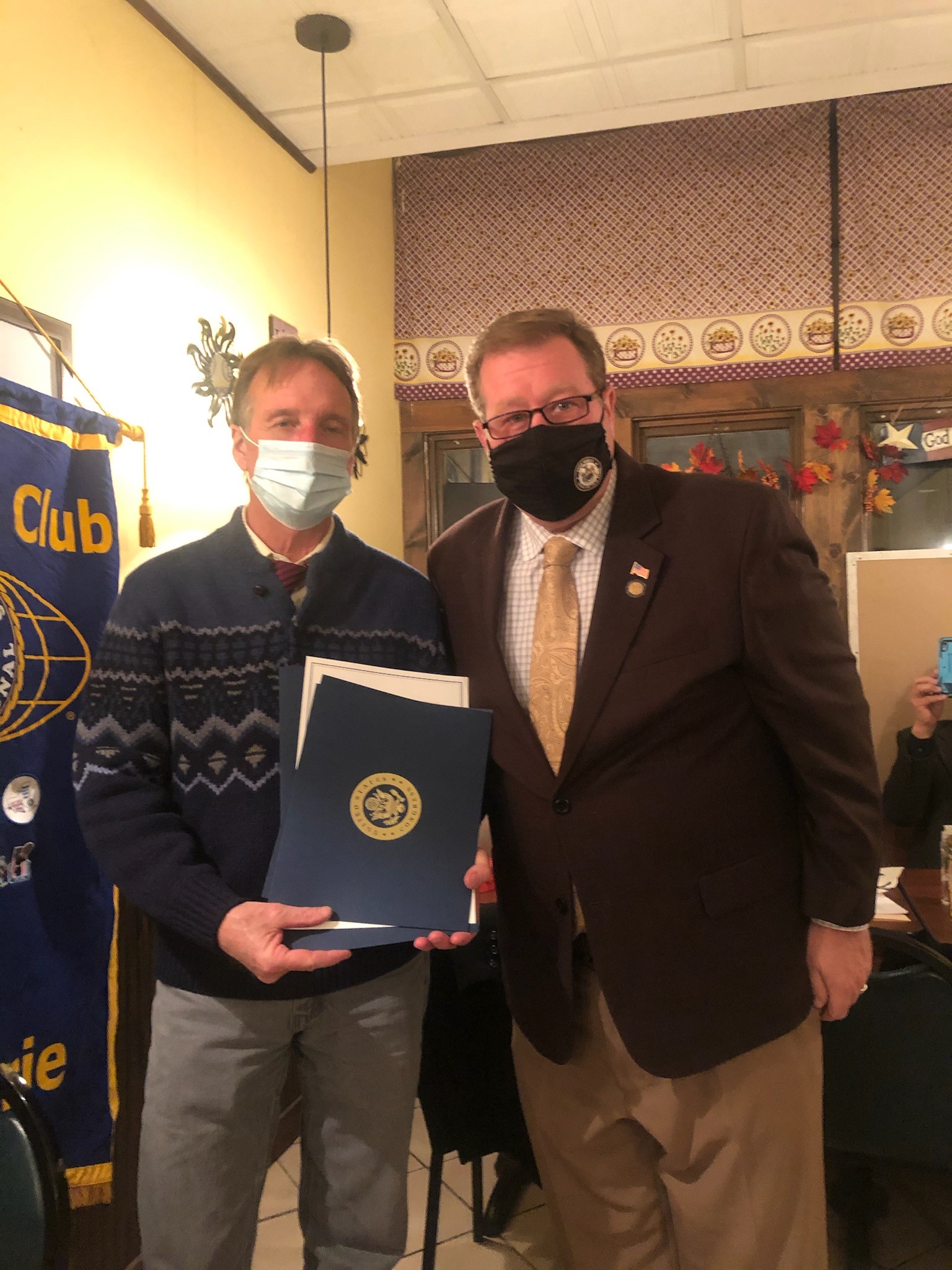 Assemblyman Chris Tague (R,C,I,Ref-Schoharie) presents Kiwanis Vice President Michael Langan with an Assembly Citation as well as recognitions from the New York State Senate and United States House of