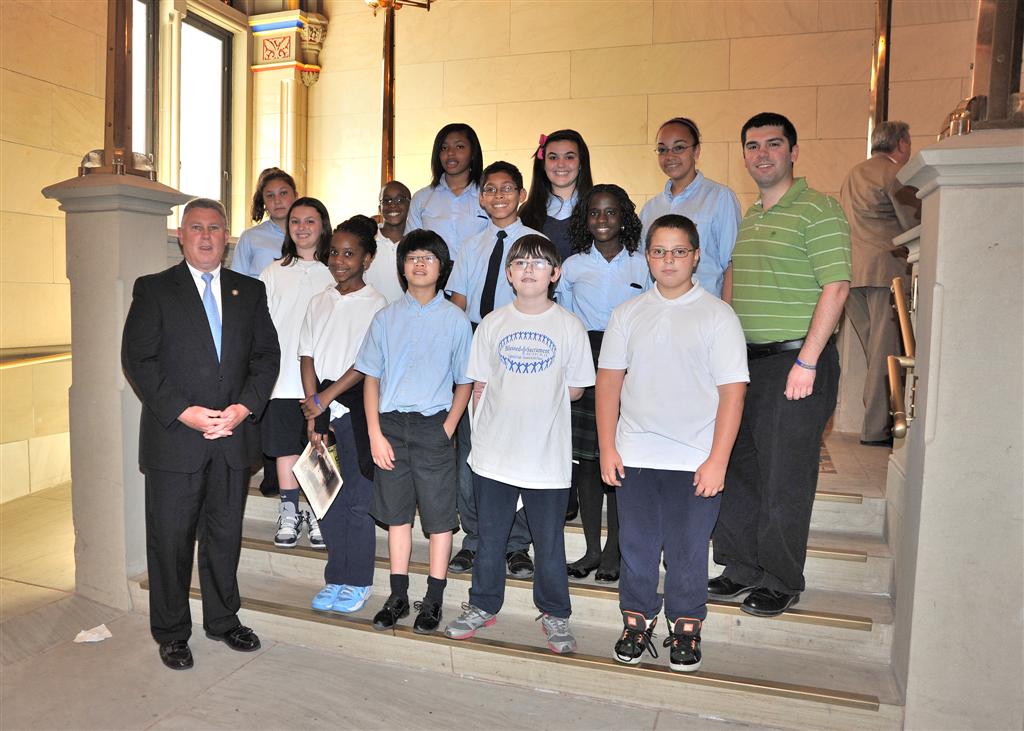 Assemblymember McDonald welcomes Blessed Sacrament to the Assembly Chambers.