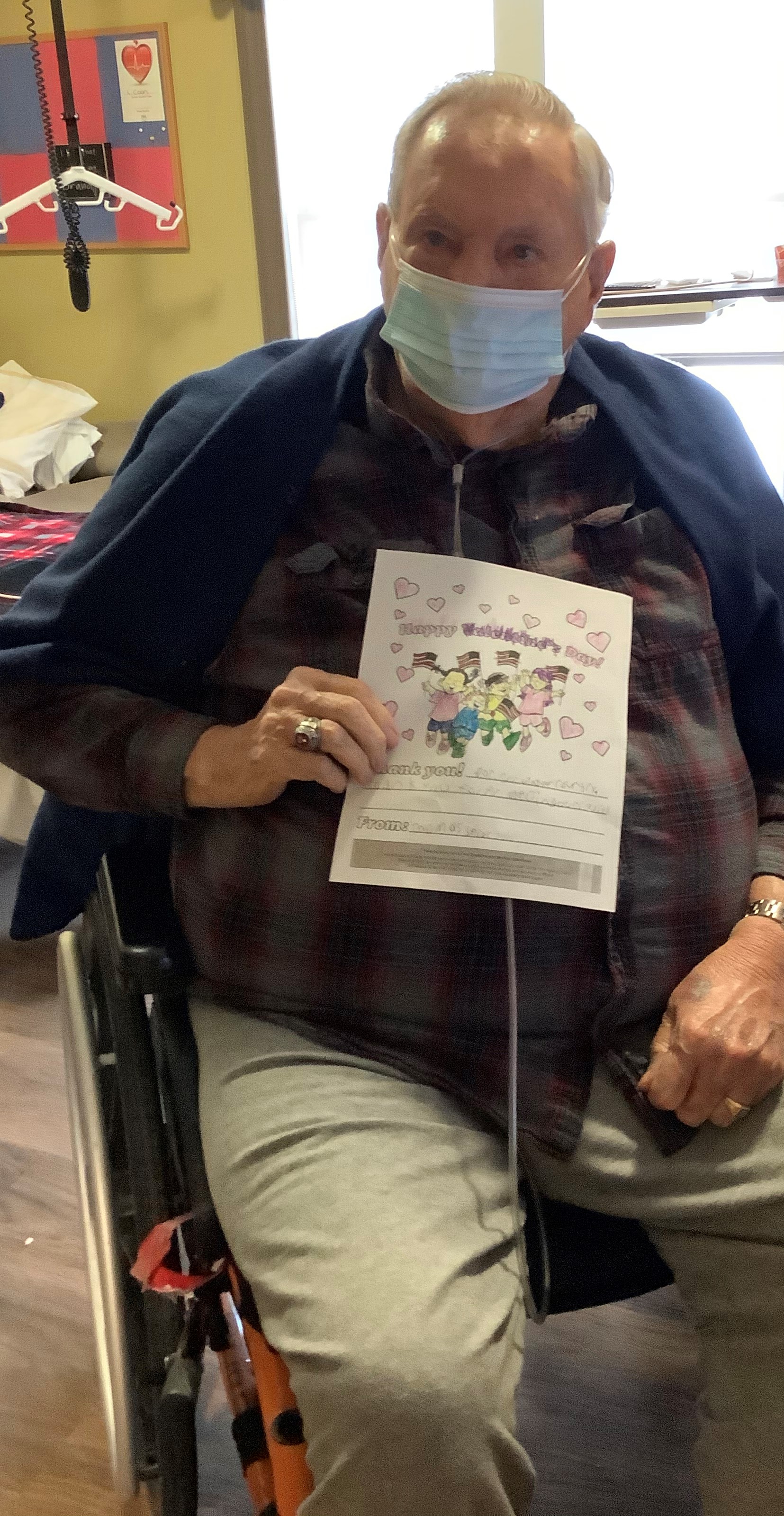 A Veteran admiring his Valentine’s Day Card thanks to Assemblywoman Buttenschon's Valentines for Vets.