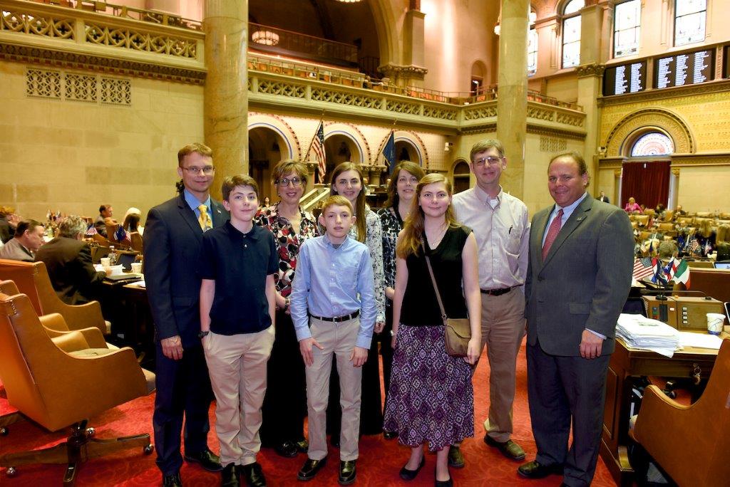 Assemblyman Christopher S. Friend (R,C,I-Big Flats), the Pawlak and Orcutt families and Assemblyman Phil Palmesano (R,C,I-Corning) in the Assembly Chamber.