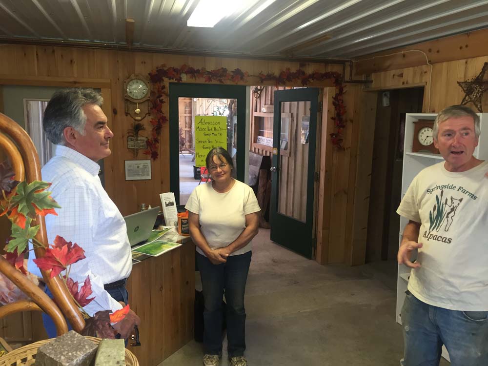 Ed and Paulie Drexler show Assemblyman Stirpe around Springside Farm, an agri-tourism farm located in Fabius.
