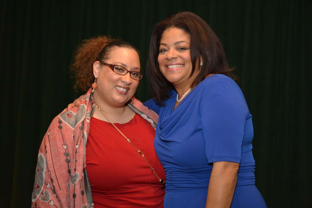 Tamar Smithers, Director of Education at Community Folk Art Center and Assemblymember Pamela J. Hunter at her swearing in which took place at Le Moyne College on December 29, 2015.