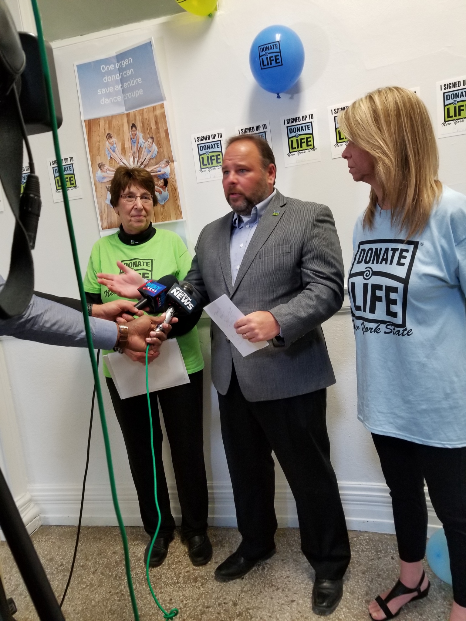 Assemblyman Palmesano speaking to reporters with Steuben County Clerk Judith Hunter pictured to the left and Deputy County Clerk Susan Cranmer pictured to the right.