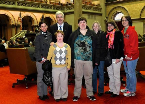 Julie Vogan, Assemblyman Andy Goodell, Jennifer Yost, Linda Bascom, Melissa Klenke, Karen Silzle and Heather Courtney meet in the Assembly Chamber at the Capitol.