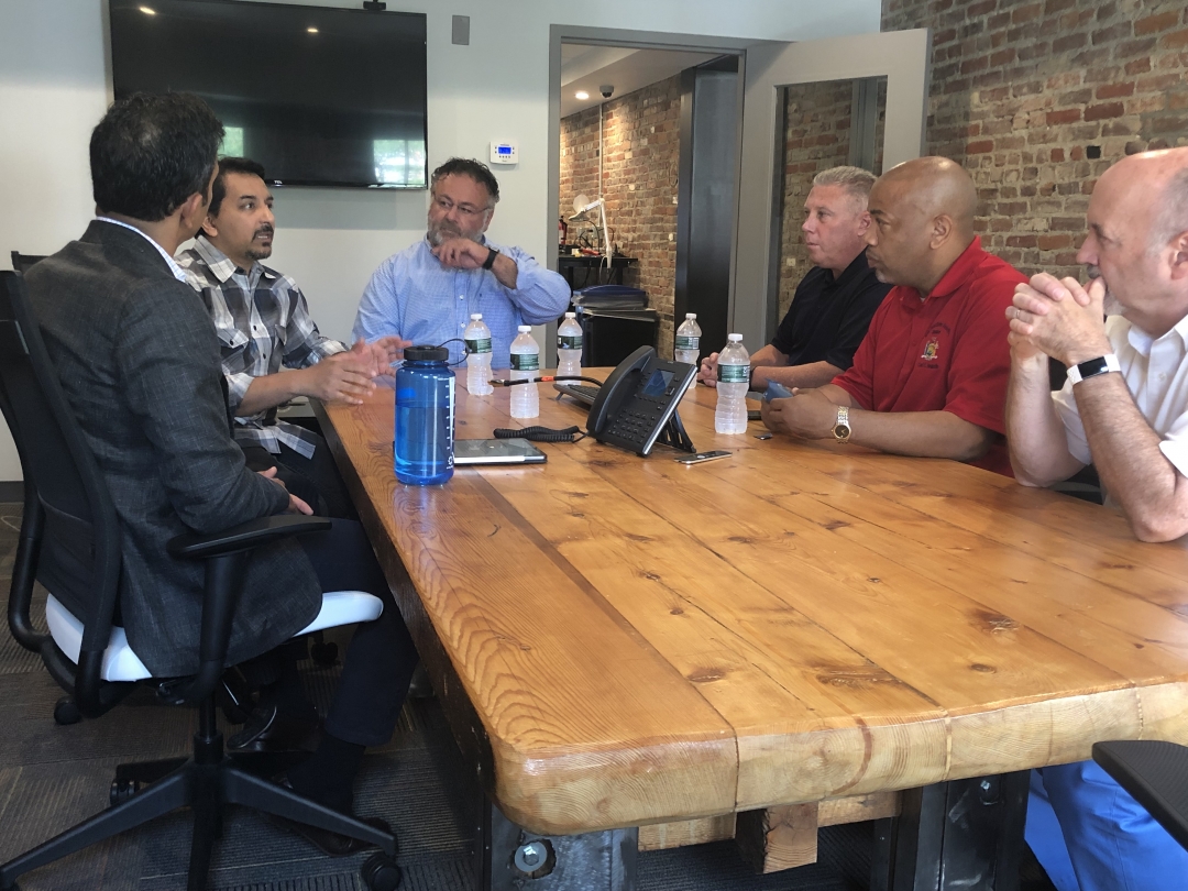 Pictured in the first photo with Speaker Heastie at Velan Studios in Troy (from left to right): Velan Ventures President Guha Bala, Velan Ventures CEO Karthik Bala, Technology Business Consultant Nehme Frangie, Assemblymember John T. McDonald III and Troy