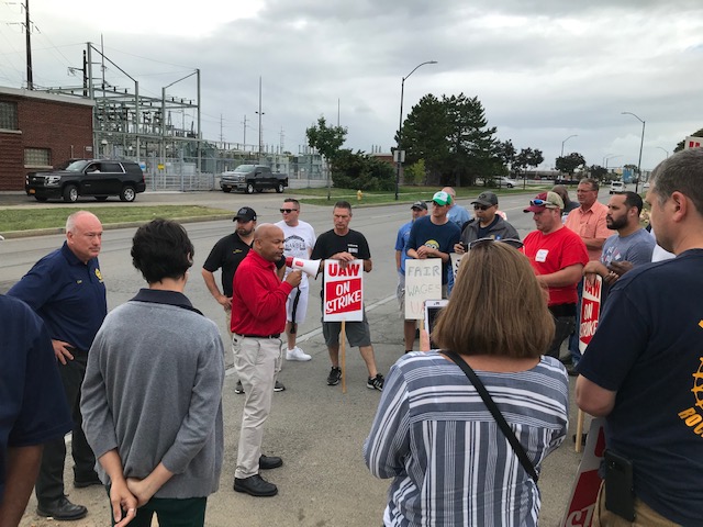 Pictured in the second photo with Speaker Heastie at the picket line in front of the Rochester GM plant are members of UAW.