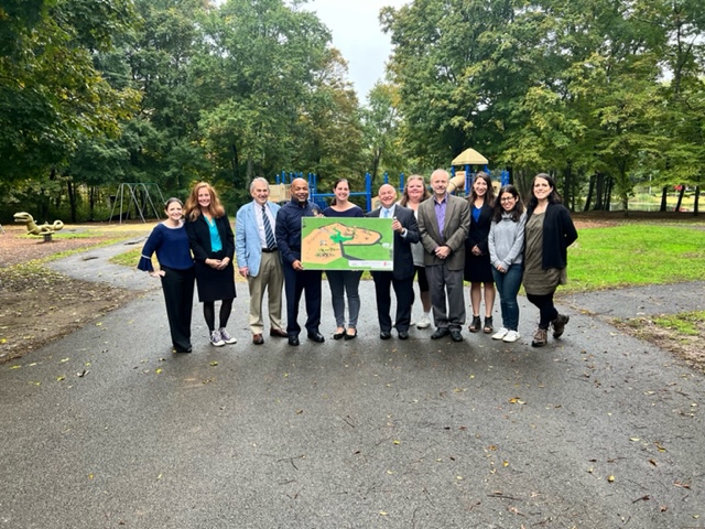Pictured in the first photo with Speaker Heastie at Lewisboro Town Park is Assemblymember Chris Burdick, Lewisboro Town Supervisor Peter Parsons, Lewisboro Town Board member Jane Crimmins and staff from Lewisboro Town Park Playground Improvement Corporati