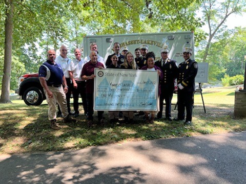 Pictured with Speaker Heastie is Assemblymember Sillitti, Manhasset-Lakeville Fire and Water District Commissioners Steve Flynn, Brian Morris and Mark Sauvigne, and members of the ambulance unit.